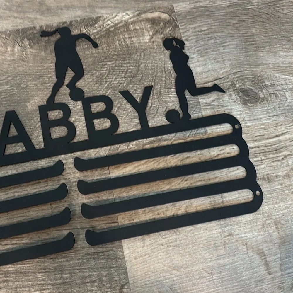 Black Medal Holder with Athlete Silhouettes Gabby